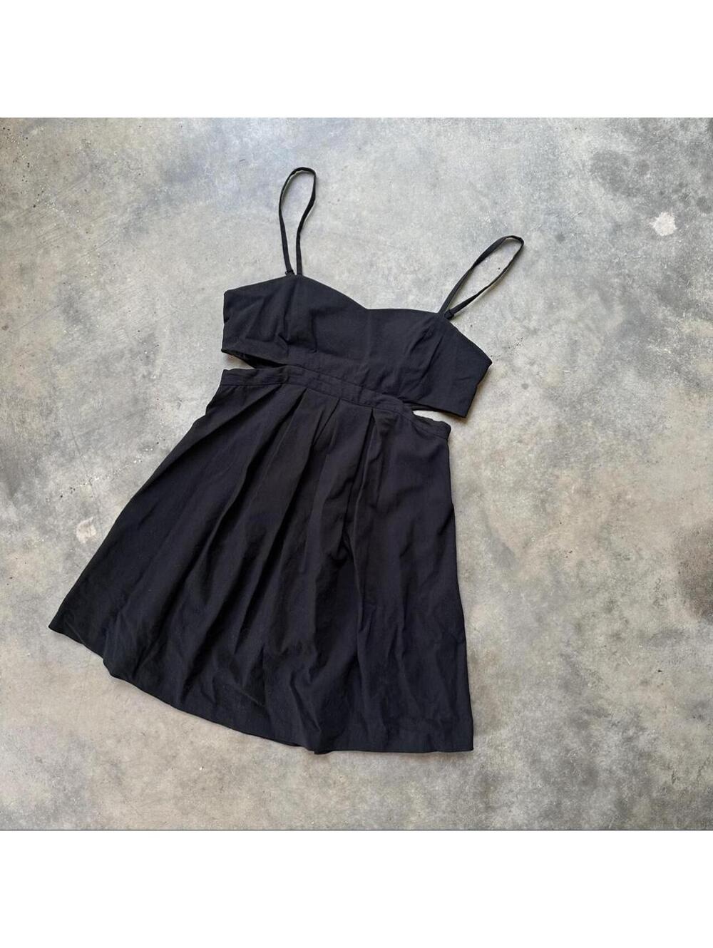 Black mini dress with cut out detail and adjustable straps